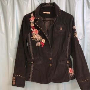 Calix brand black corduroy jacket featuring floral embroidery